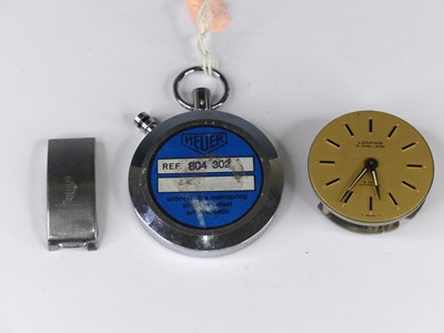 Lot 411 - A Heuer chrome pocket watch housing; together...
