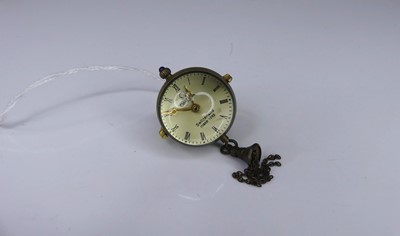 Lot 414 - After Omega - a gilt metal and perspex pedant...