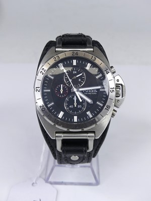 Lot 415 - A Fossil gent's steel cased quartz chronograph...
