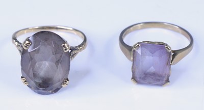 Lot 431 - A 9ct gold smoky quartz set dress ring, size R;...