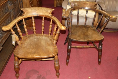 Lot 1289 - Two similar early 20th century elm seat...