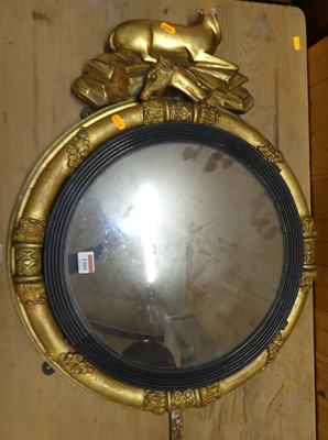 Lot 1305 - A Regency period gilt wood circular convex...