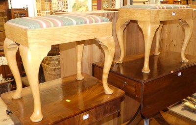 Lot 1307 - A pair of satin birch dressing stools, each...