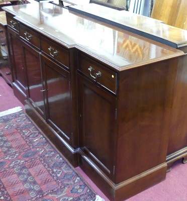Lot 1323 - A contemporary mahogany breakfront four door...