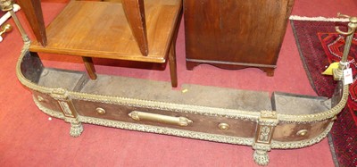 Lot 1325 - A 19th century steel and brass fire curb with...