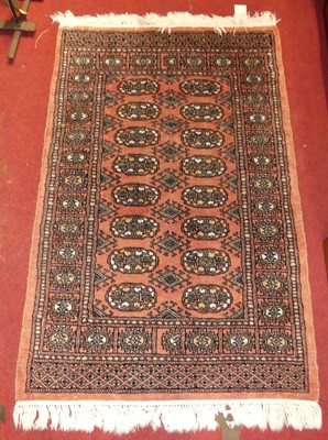 Lot 1334 - A Persian woollen turquoise ground Bokhara...