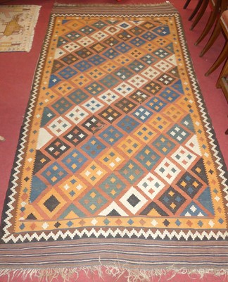 Lot 1336 - *A Turkish woollen kilim rug, having a multi...