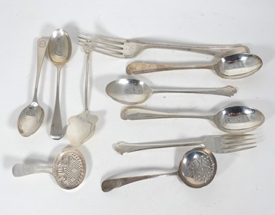 Lot 433 - A 19th century white metal caddy/sifting spoon...