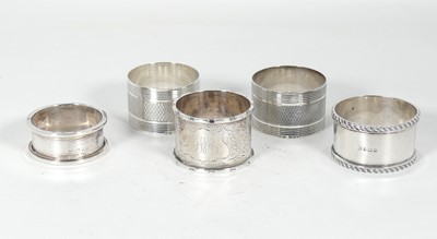 Lot 434 - A George V silver napkin ring having banded...
