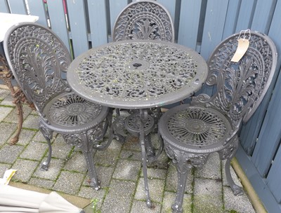 Lot 1353 - A painted and pierced galvanised metal patio...