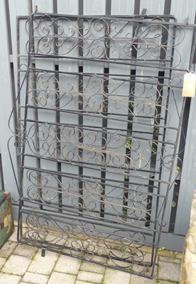 Lot 1355 - A pair of black painted scroll wired metal...