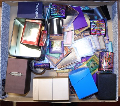 Lot 587 - A box containing a collection of Yu-Gi-Oh...