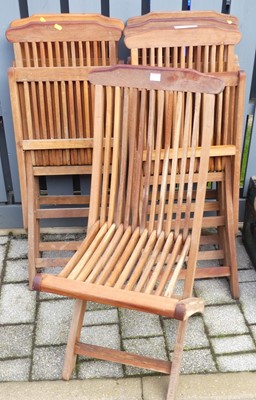 Lot 1357 - *A set of six contemporary slatted teak...