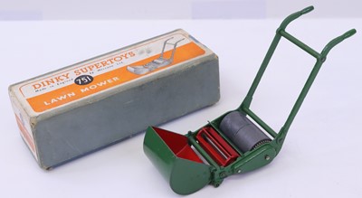 Lot 1048 - A Dinky Toys No. 751 lawnmower comprising...