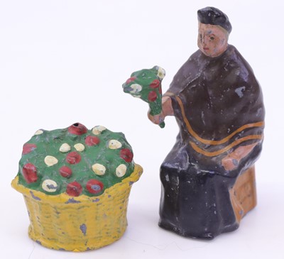 Lot 1533 - Charbens flower seller, comprising seated...