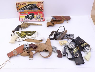 Lot 1773 - Collection of mixed cap guns and holsters, to...